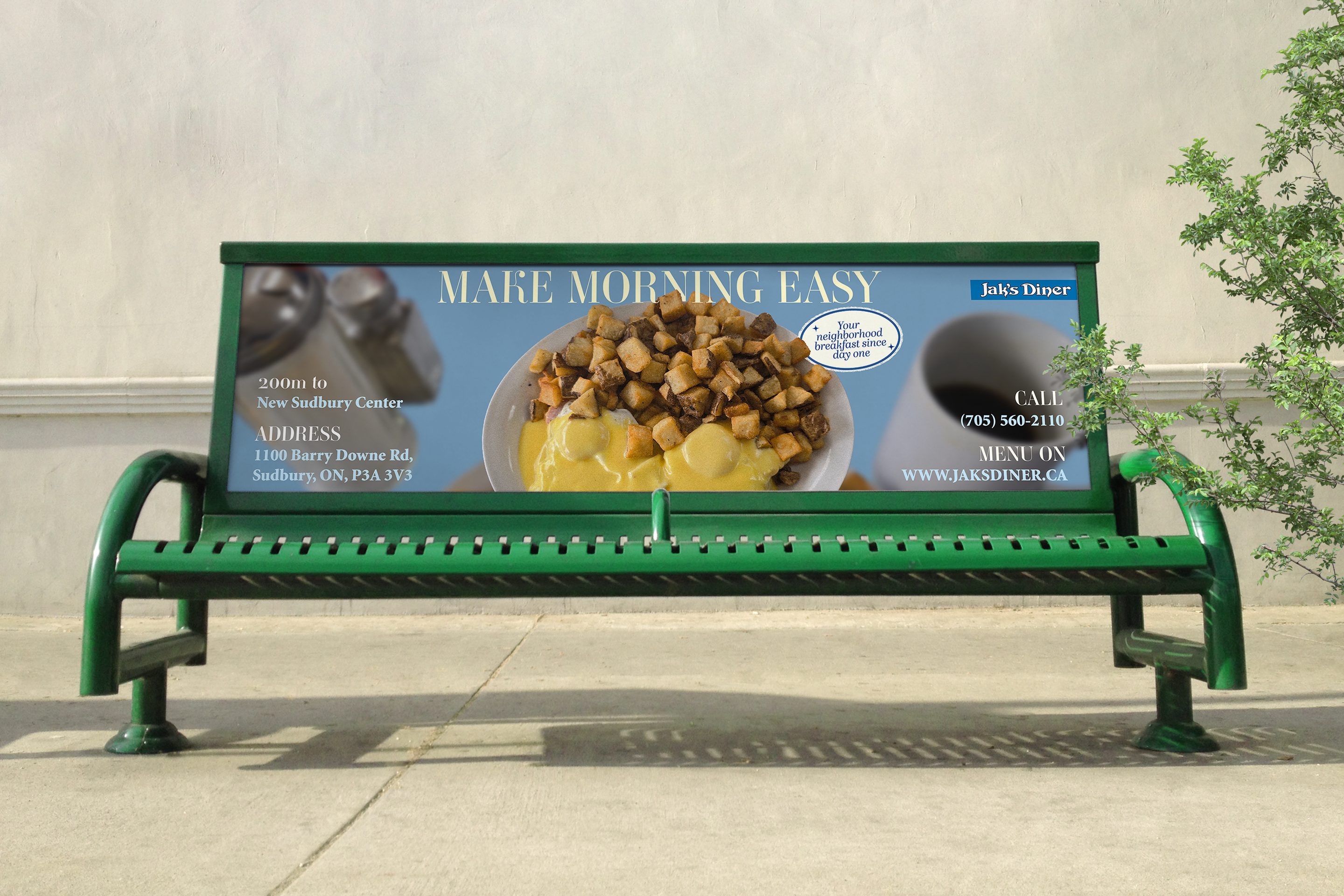 Jak’s Diner ad on a green bus-stop bench: Make Morning Easy over a breakfast plate