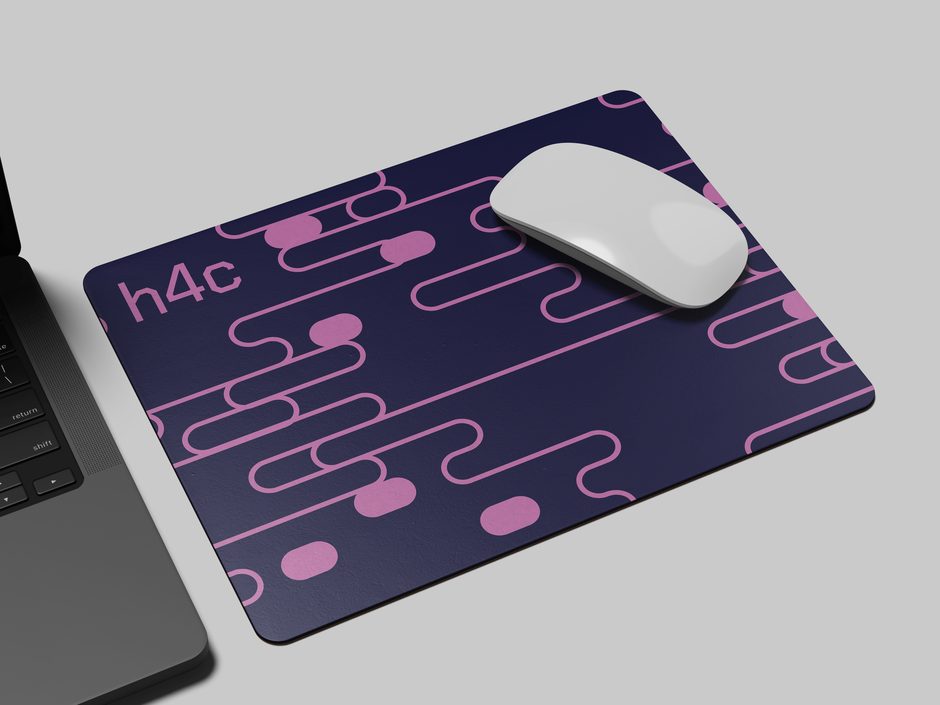 Mousepad mockup with h4c and the pink line pattern on navy