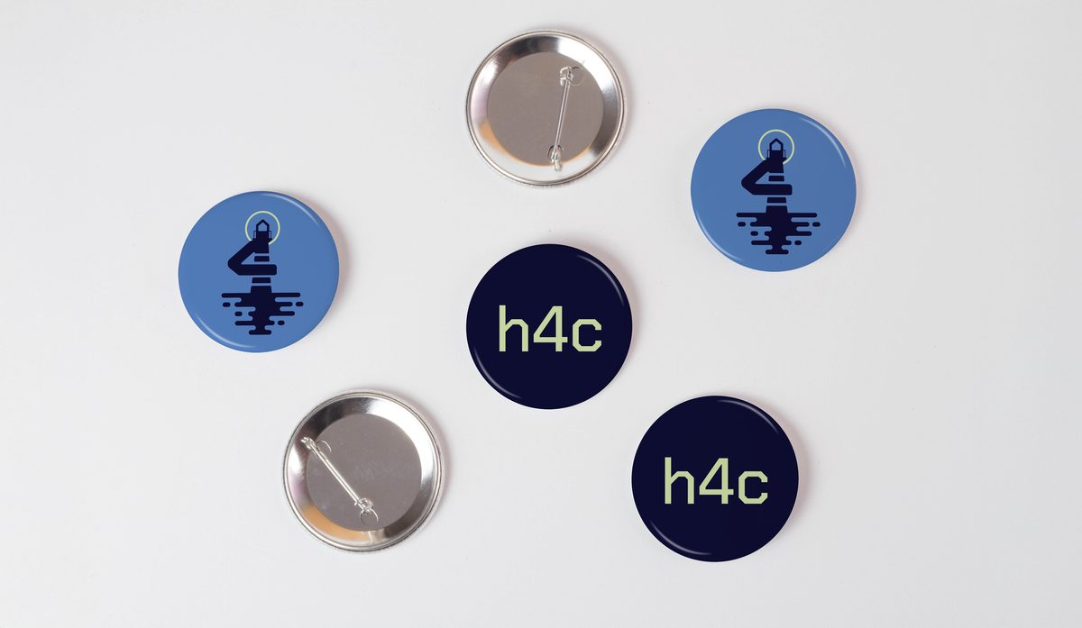 Pin button mockup with the lighthouse 4 and h4c on blue and navy buttons