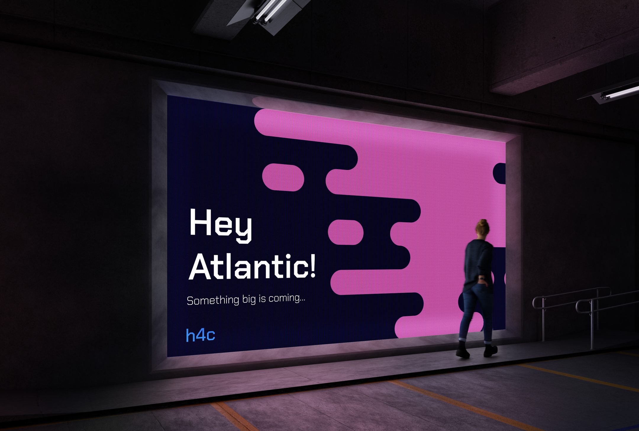 Screen ad mockup in an underground passage: Hey Atlantic! Something big is coming, with h4c