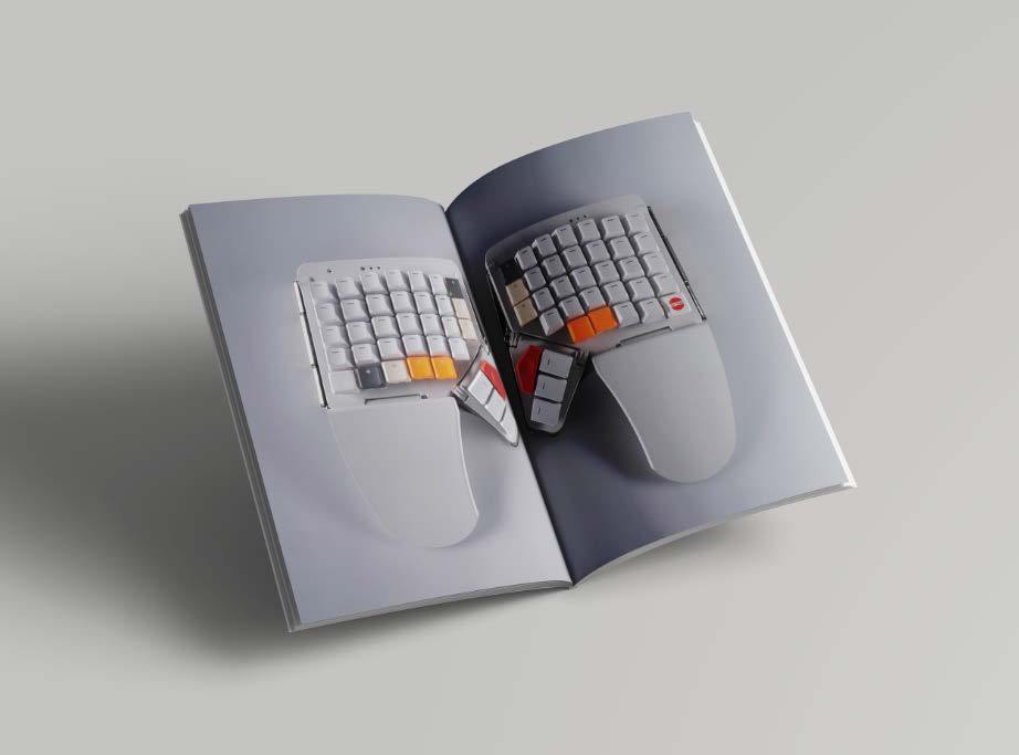 Open magazine with a ZSA Moonlander keyboard spread