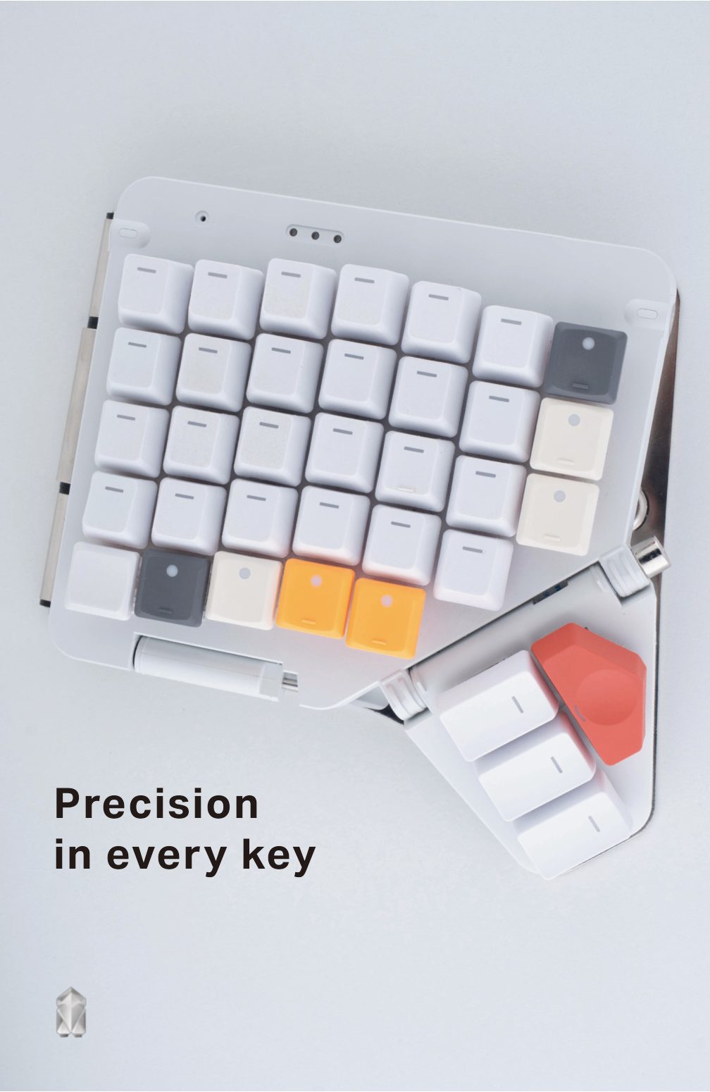 Poster: the keyboard’s key grid with orange and red keys, Precision in every key